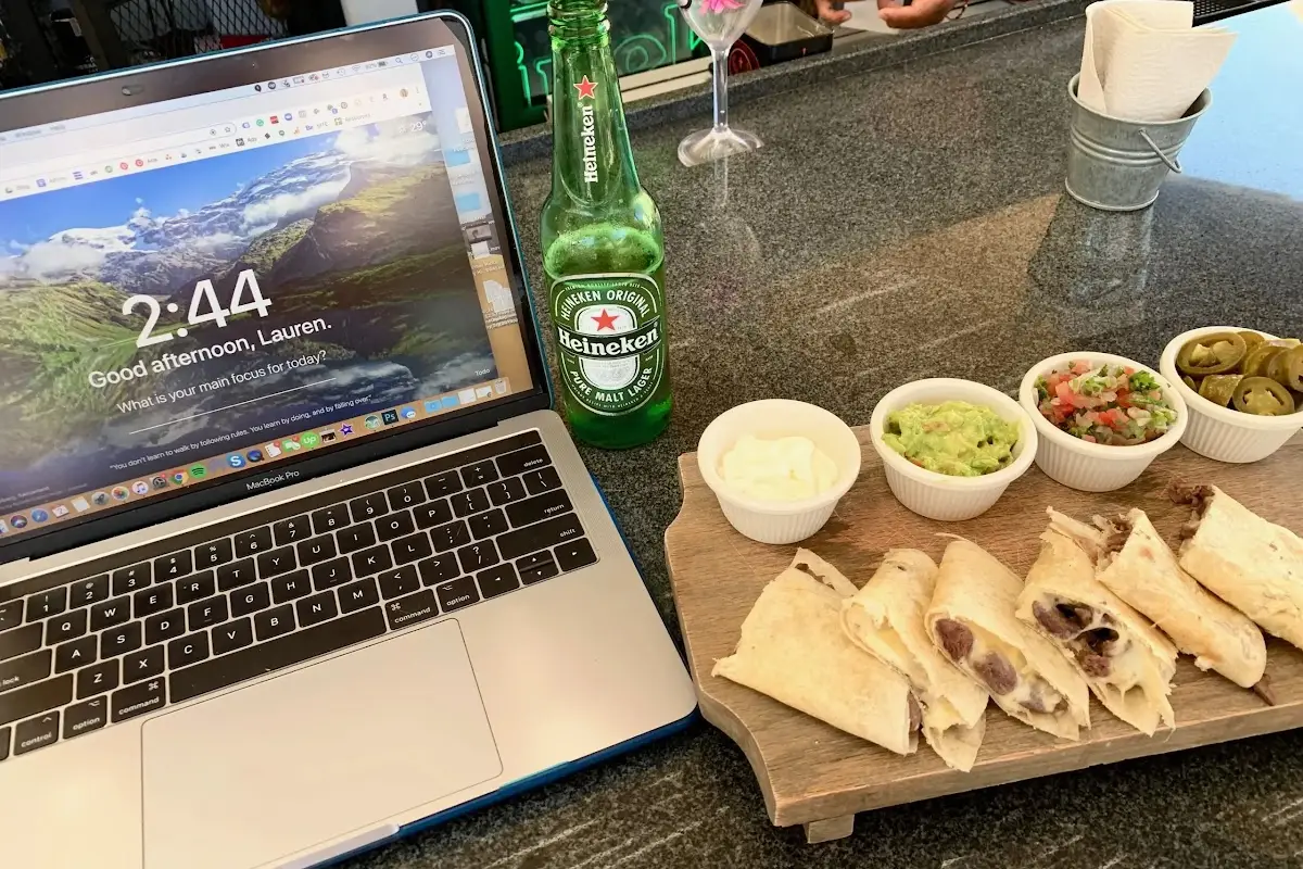 Cabo Mexico digital nomad working from the restaurant at Mayan Monkey hostel