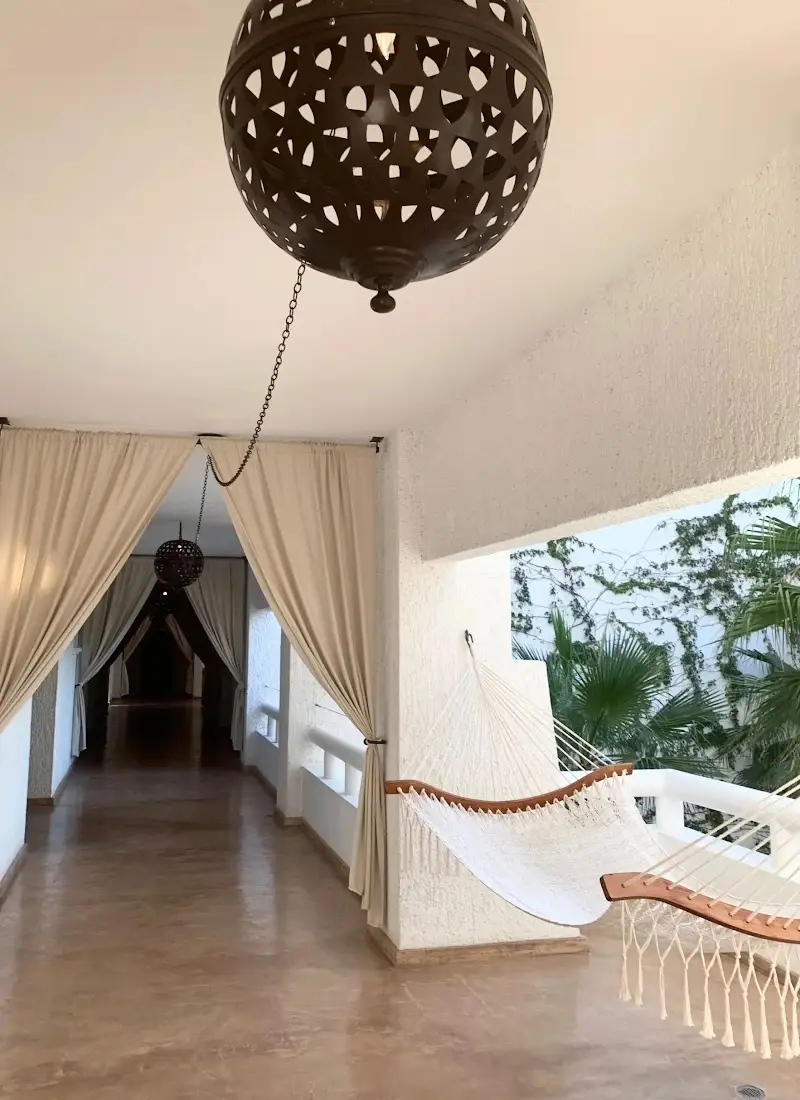 Hammock and hallway at the Bahia House hotel in Cabo