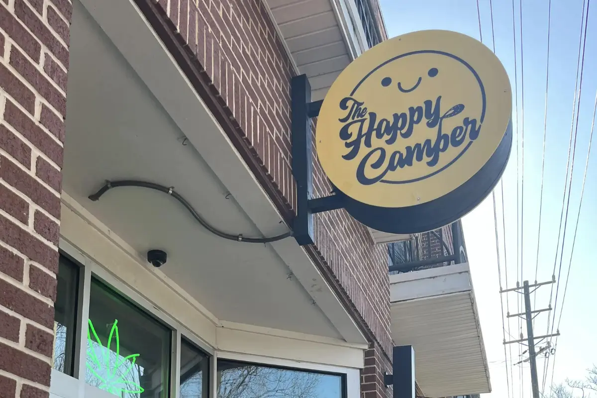 Happy Camper sign in NODA Charlotte, which is a dispensary for marijuana and CBD products