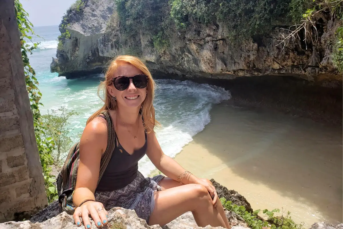 Lauren Kessel, the author of Inspired Backpacker, hanging out at a cliff near Delpi Cafe at Suluban Beach 