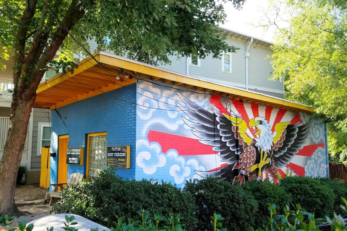Mural and exterior of the 510 Expert Tattoo Studio in NoDa Charlotte