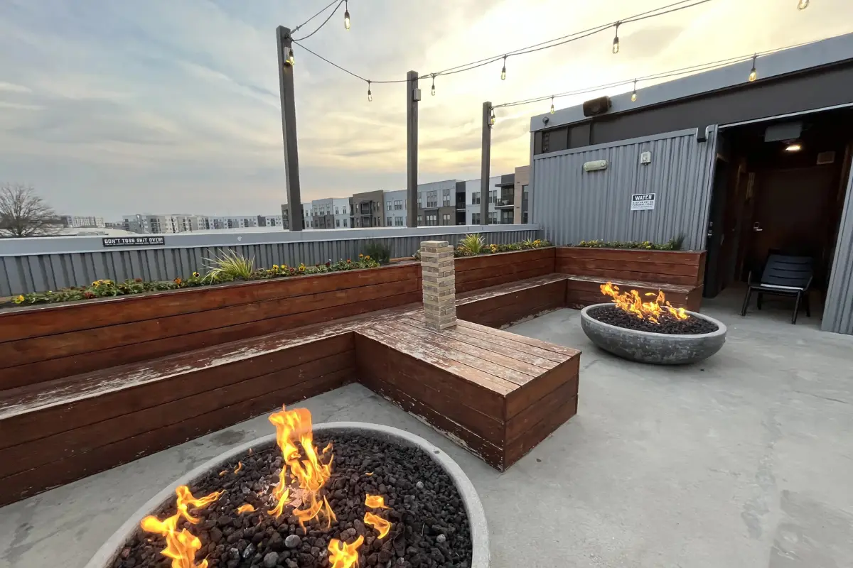 Outdoor terrace and patio with fire pits at Pins Mechanical Co Charlotte