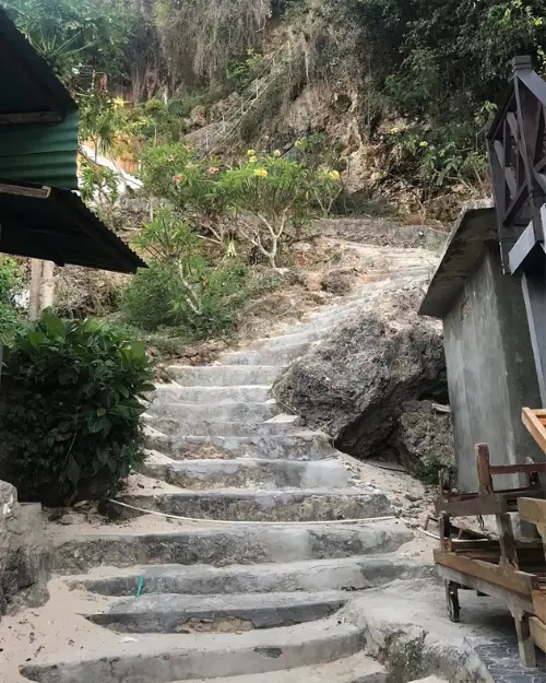 Rock steps leading down to Thomas Beach in Bali