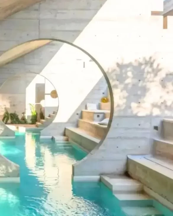The iconic pool at Casa TO with beautiful circular architecture