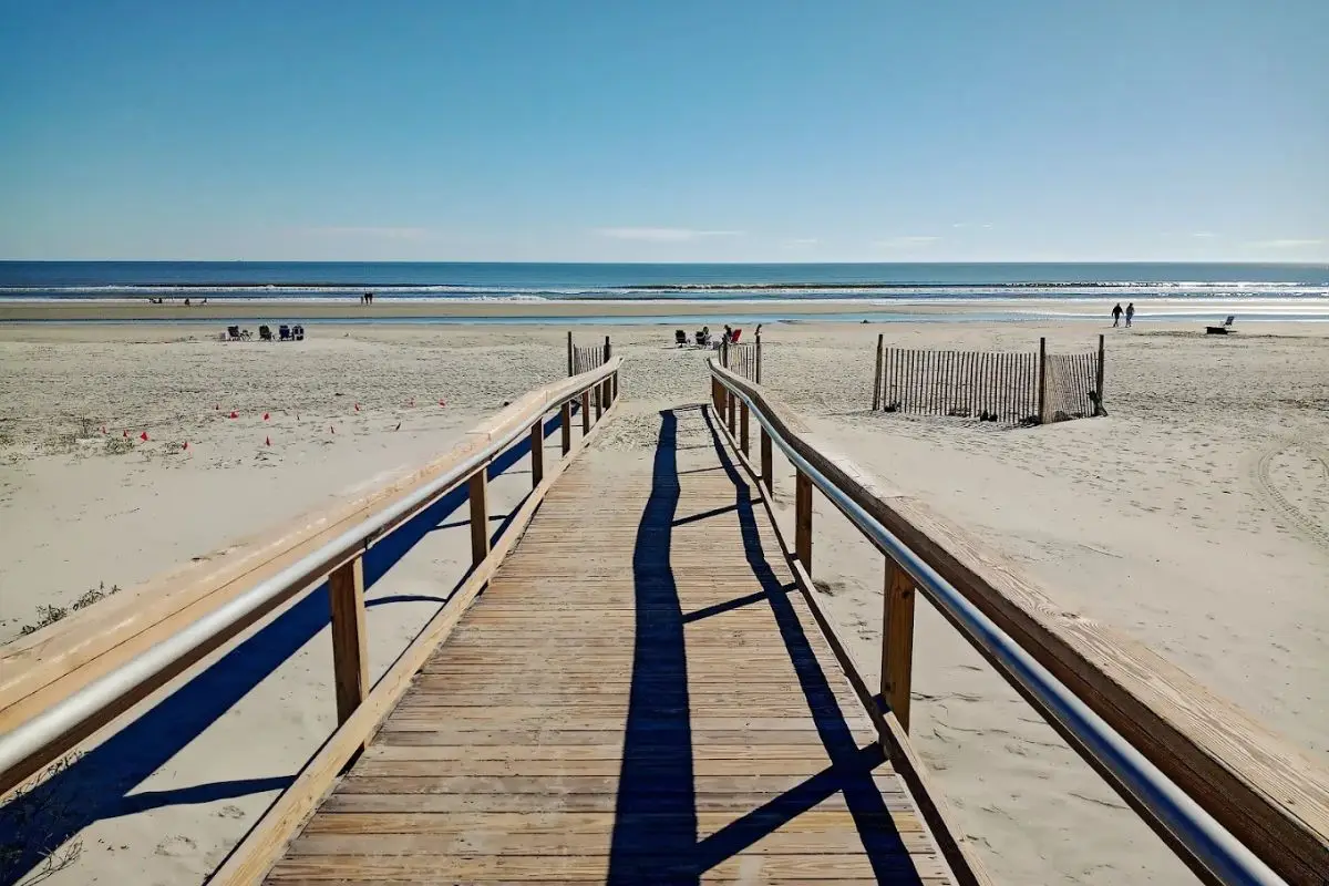 Kiawah Beachwalker Park's boardwalk leading to an empty, pristine beach, one of the best Charleston SC beaches
