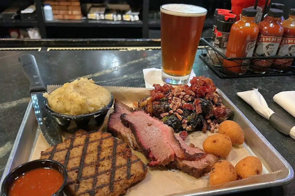 Barbecue platter including juicy brisket, mashed potatoes, hushpushies and more at Jimmy Madisons in Harrisonburg