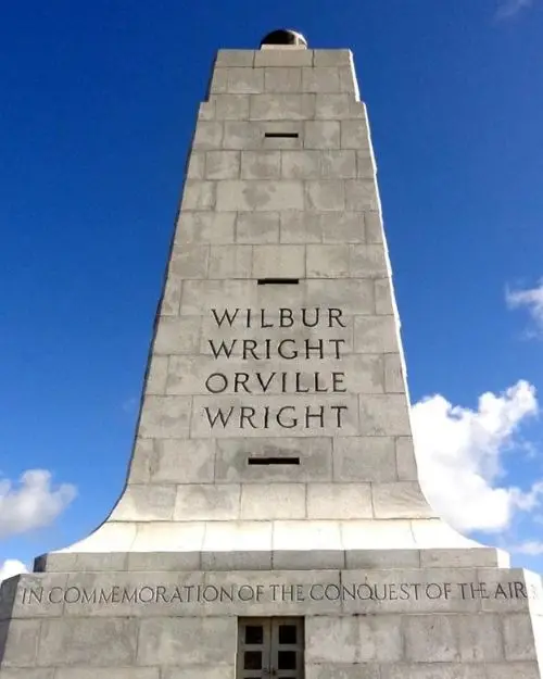 A close up image of the Wright Brothers Memorial on a sunny day