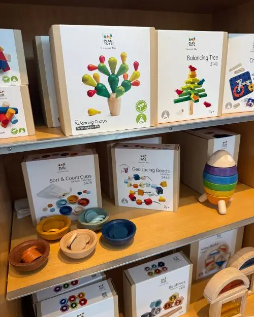 Unique wooden toys on the shelves at the gift shop