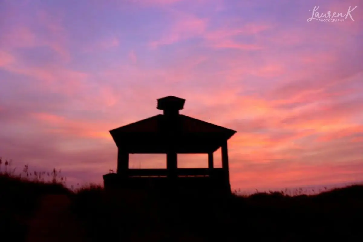 A photograph I took of the gazebo with a beautiful pink sunrise behind at Shutters on the Banks