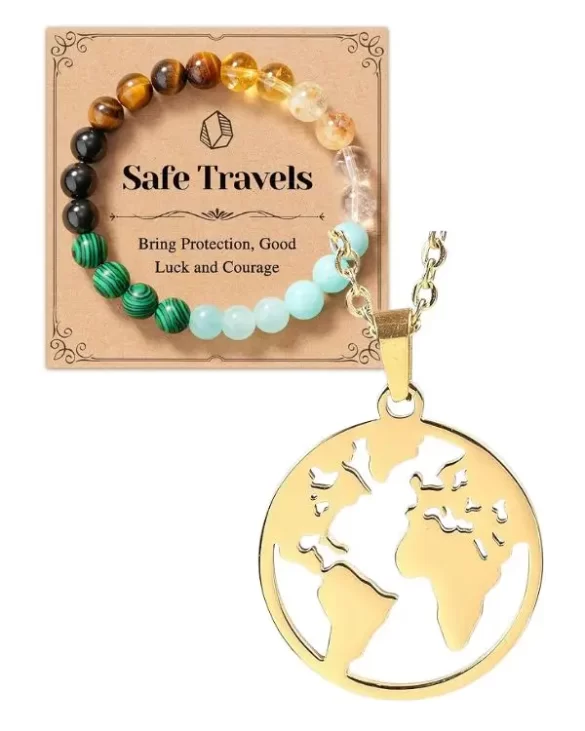 A safe travels bracelet with different colored beads that are supposed to bring protection, good luck and courage, along with a gold globe necklace