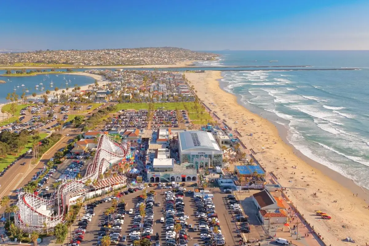 Aerial view of Belmont Park with the city and beach both in the photo, to show that Mission Beach is one of the best beaches in San Diego