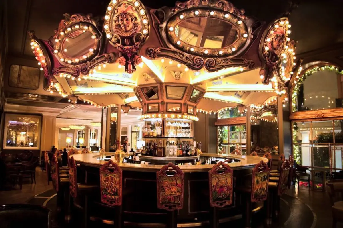 The legendary carousel in the lobby at the Hotel Monteleone in a dimly lit atmosphere