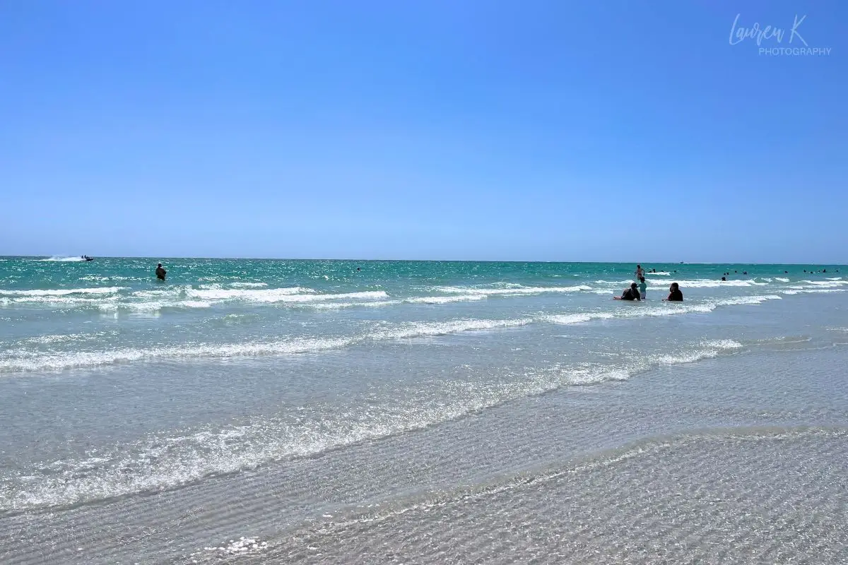 A photograph I took of a beautiful beach day at St Pete Beach with sparkly ocean and cloudless sky
