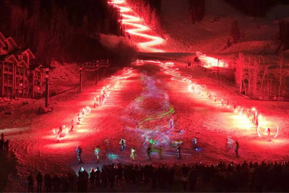 Red glowing lights on the ski mountain, to show what the Torchlight parade looks like at Park City