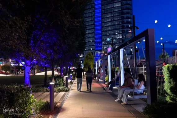 Cover image for the bars in Tysons Corner va blog which shows the rooftop garden area between Perch Putt and Star Hill biergarten lit up at night