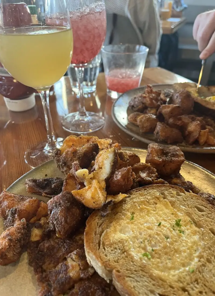 Brisket hash and brunch drinks at Bearcat New Orleans