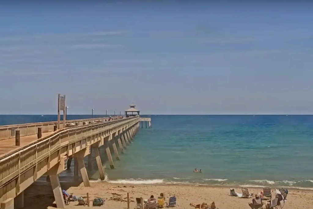 Cover image for the Deerfield Beach Live Cam blog which shows a pier over the ocean