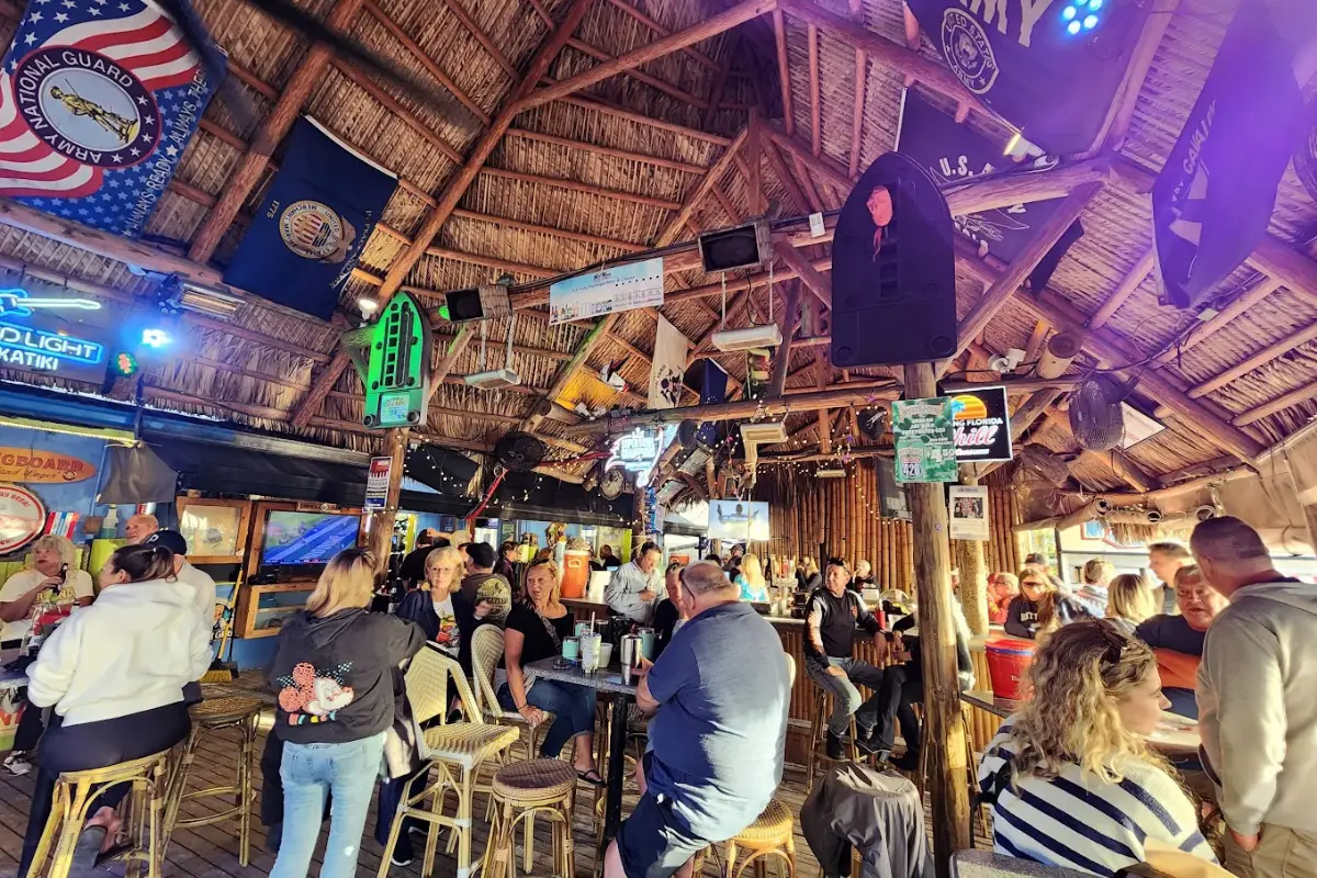 Inside the hatched roof and tiki bar at KaTiki in Treasure Island