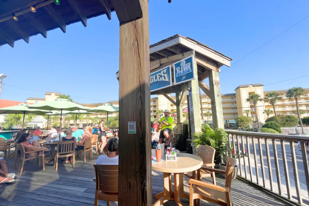 Loggerheads live music Folly Beach bar on a sunny afternoon with live music on the deck