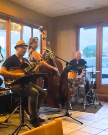 Musicians playing jazz music at Sola, a St Pete Beach wine bar